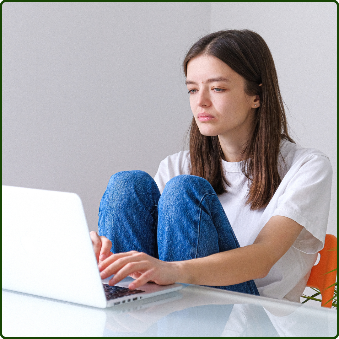 image of young person on computer