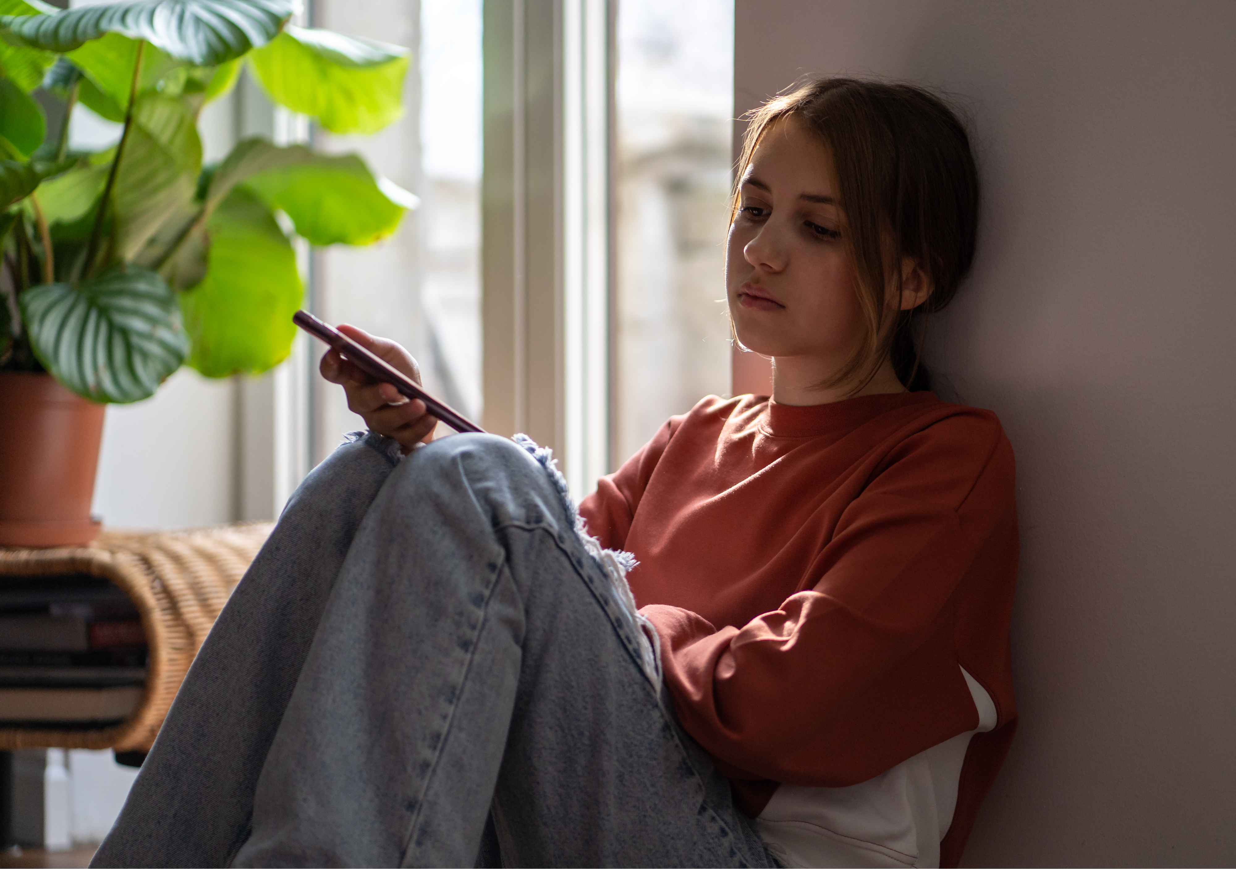 kid 1 image of young person on phone